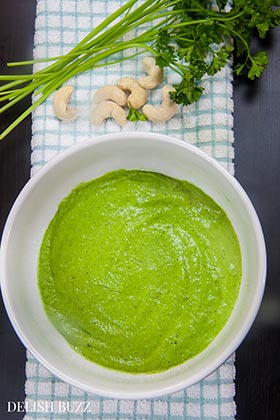Vegan pesto is creamy rich and is completely vegan :) This simple pesto is made from fresh parsley and raw cashews. Vegan cashew pesto is so versatile that it can be used in many things beyond pastas. It has the yummy deep richness of greens and zesty aromas of fresh herb - www.delishbuzz.com