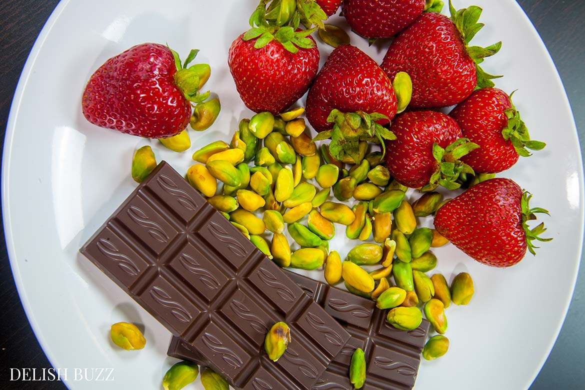 Bringing together best ingredients, colors and flavors. Easy delicious summery gluten free strawberry pizza. Very refreshing and full of subtle flavors. Strawberries on a sugar cookie crust with a layer of light lemon scented creamy frosting with apricot glaze. This will be a show stopper on any dining table. www.delishbuzz.com